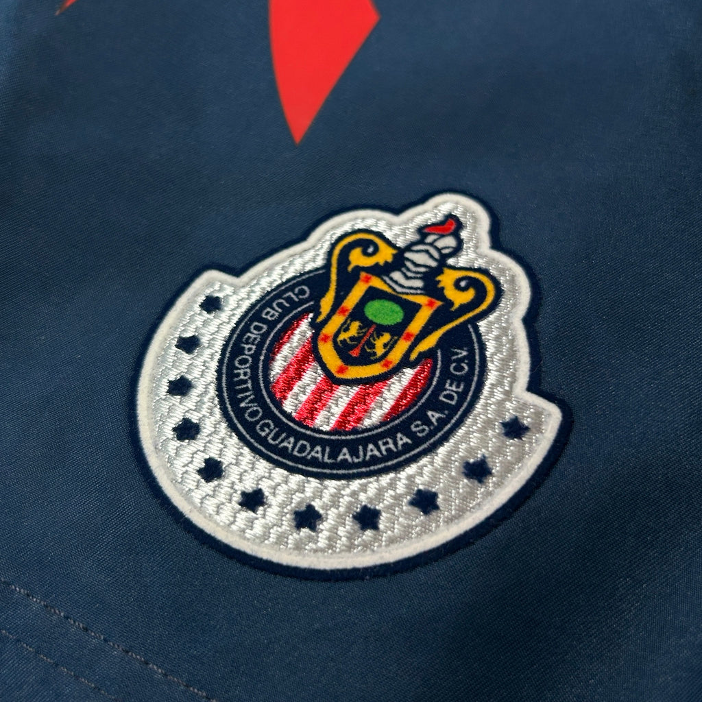 Vintage Reebok Chivas Guadalajara training shorts embroidered crest closeup
