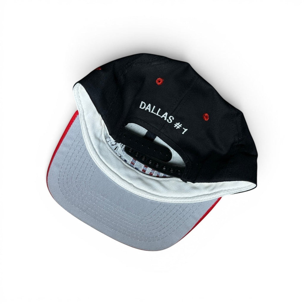 ACOLDWASH black snapback cap with red trim and grey brim, embroidered with "DALLAS #1" on the back.