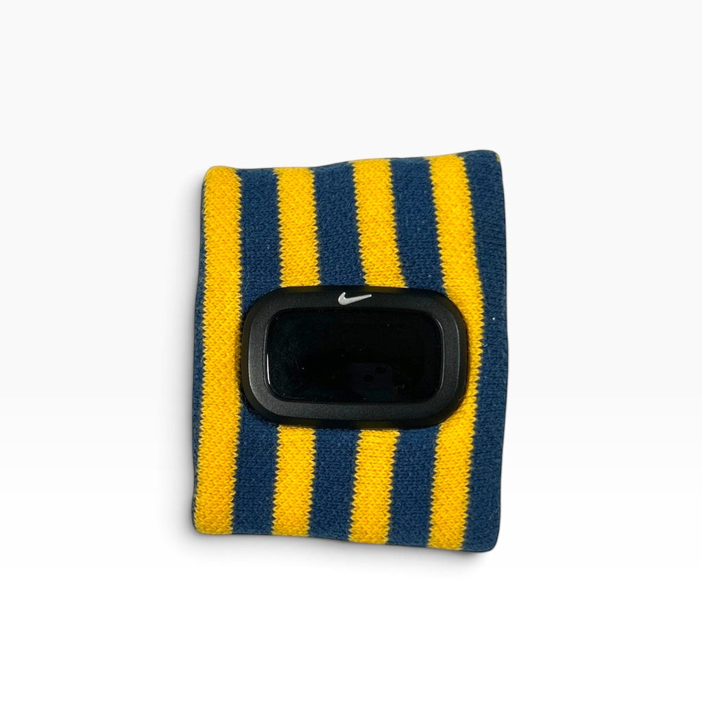 ACOLDWASH vintage Nike Timing Club América digital cuff watch with a yellow and navy striped knit wristband.