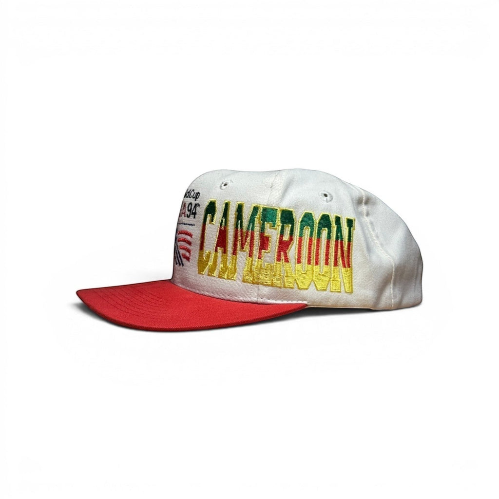 ACOLDWASH USA 94 Cameroon multi-color embroidered snapback cap with a red brim.