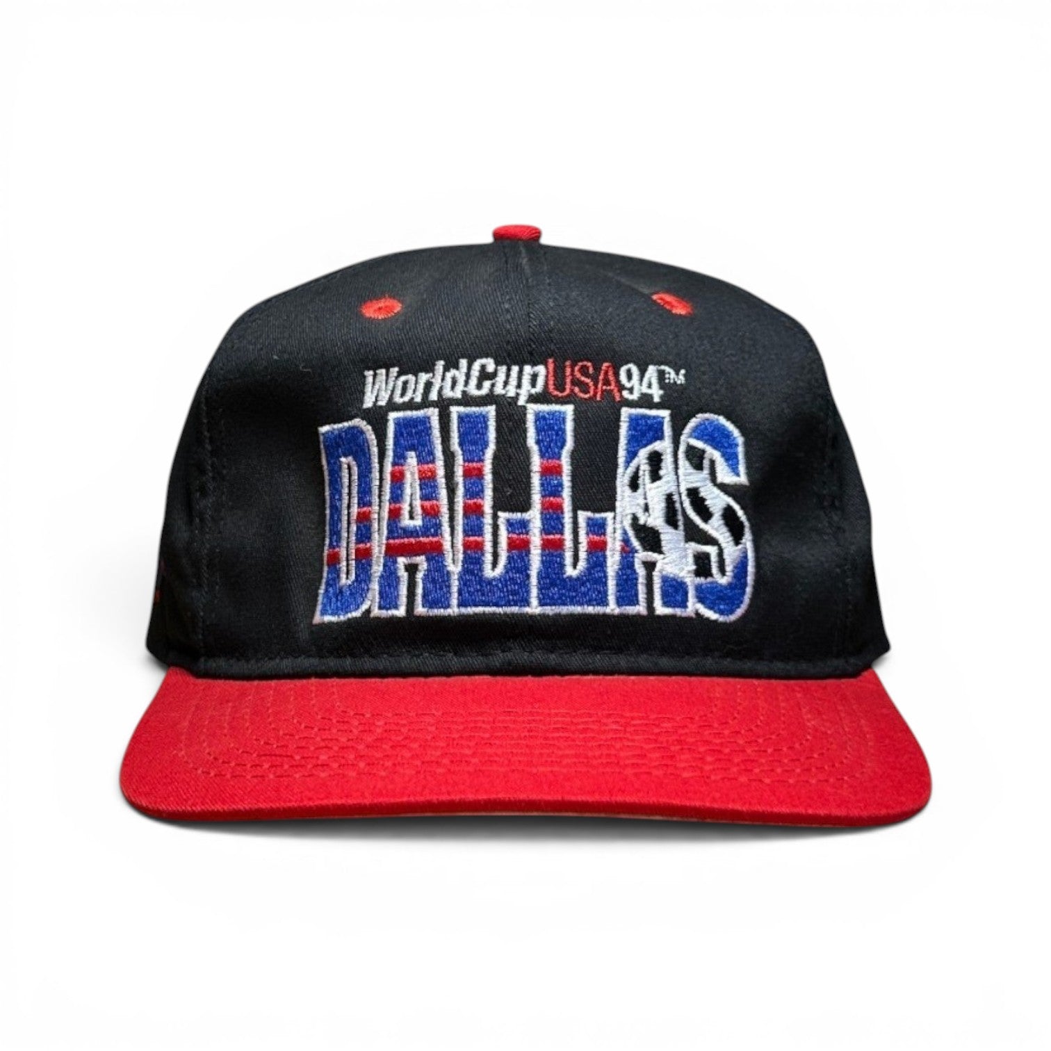 ACOLDWASH black snap cap with red brim, featuring "WorldCupUSA94" and embroidered "DALLAS" with a soccer ball graphic.