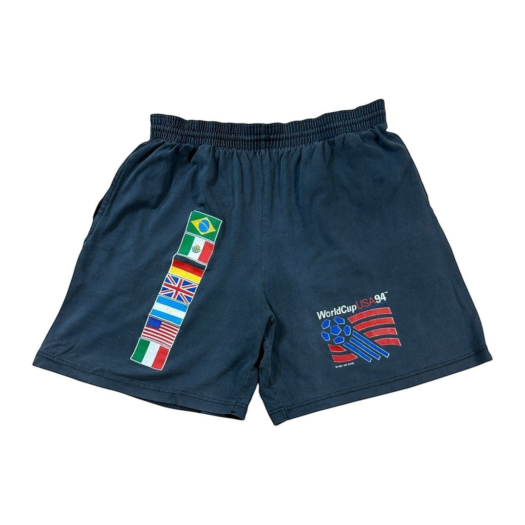 ACOLDWASH charcoal grey shorts with World Cup USA 94 logo and a vertical flag collage. Size Large