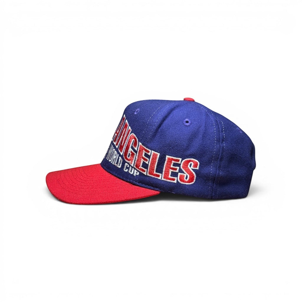ACOLDWASH blue and red USA 94 Los Angeles World Cup baseball cap with embroidered text.