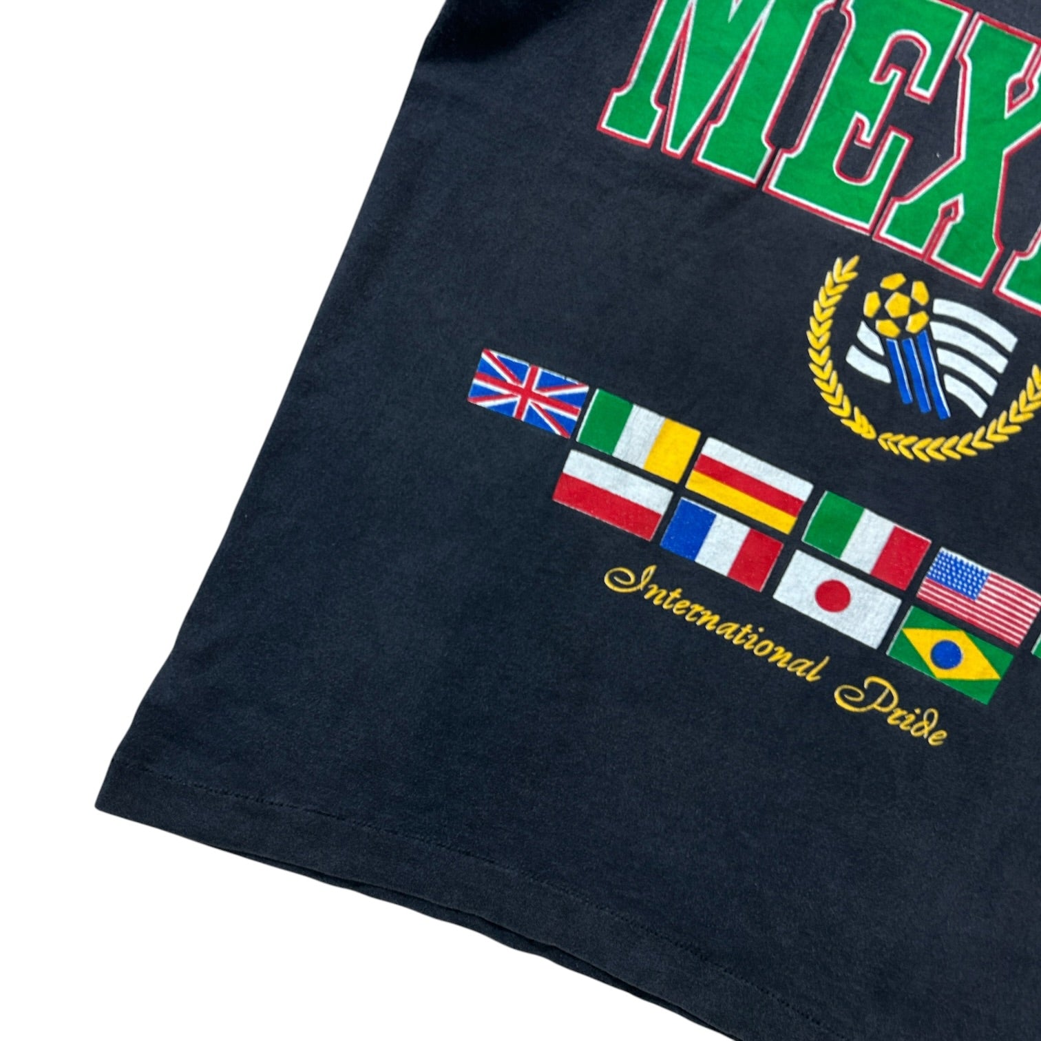 Mexico International Pride tee lower graphic and single-stitch hem detail